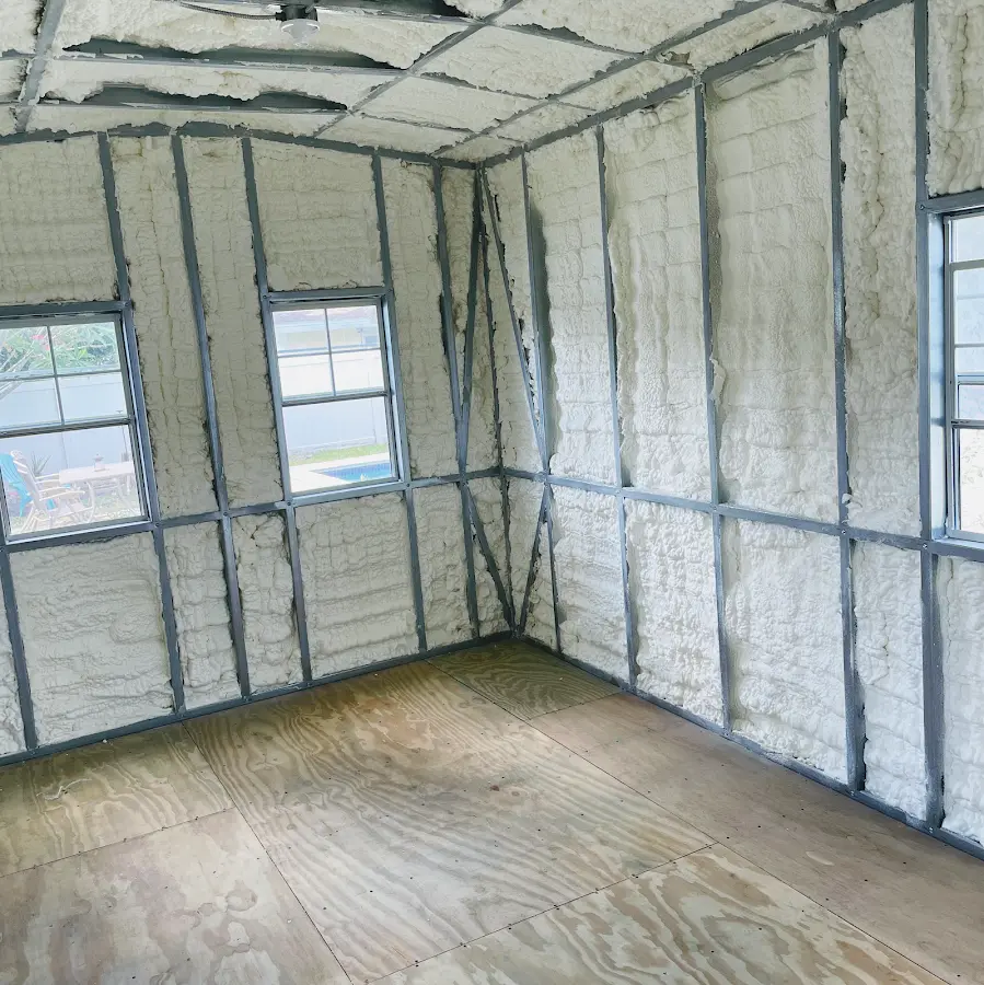 Closed-cell spray foam insulation applied to wall cavities in a residential project in Douglass Hills